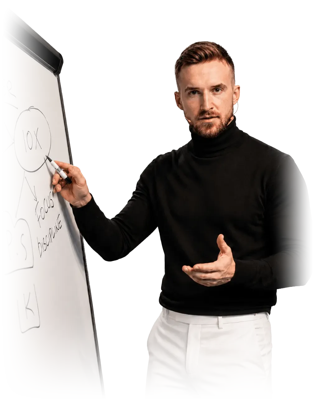 Jakub teaching at a whiteboard